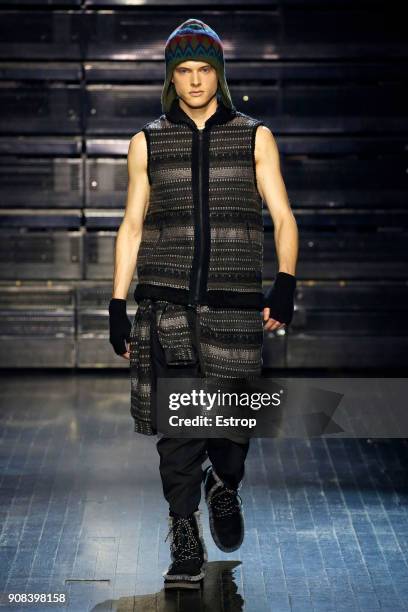 Model walks the runway during the White Mountaineering Menswear Fall/Winter 2018-2019 show as part of Paris Fashion Week on January 20, 2018 in...