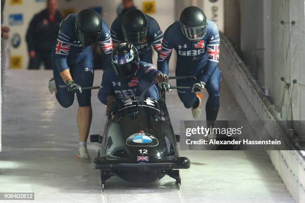 Lamin Deen of Great Britain competes with Ben Simons, Samuel Blanchet and Andrew Matthews at Deutsche Post Eisarena Koenigssee during the BMW IBSF...