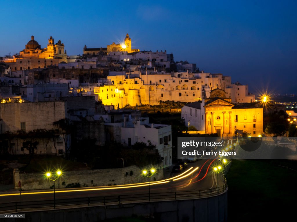 The hill town of Ostuni in Apulia, southern Italy, at night with the Basilica Cathedral illuminated