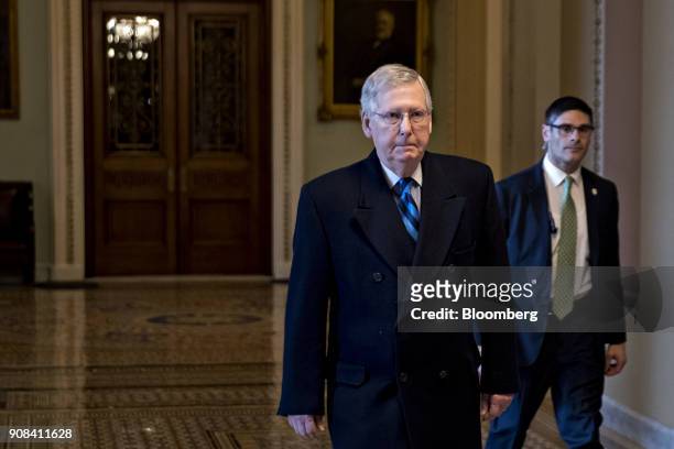 Senate Majority Leader Mitch McConnell, a Republican from Kentucky, left, walks toward his office at the U.S. Capitol in Washington, D.C., U.S., on...