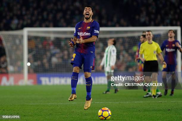Barcelona's Uruguayan forward Luis Suarez reacts during the Spanish league football match between Real Betis and FC Barcelona at the Benito...