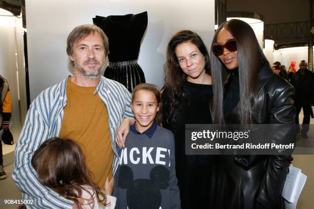 Designer Marc Newson, his wife Charlotte Stockdale, their daughters and Naomi Campbell attend the "Azzedine Alaia : Je Suis Couturier" Exhibition as...