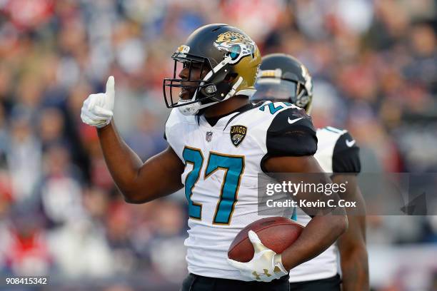 Leonard Fournette of the Jacksonville Jaguars celebrates after scoring a touchdown in the second quarter during the AFC Championship Game against the...