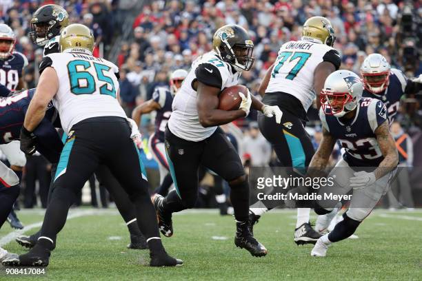 Leonard Fournette of the Jacksonville Jaguars carries the ball in the second quarter during the AFC Championship Game against the New England...