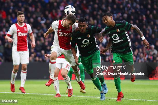 Jean-Paul Boetius and Renato Tapia of Feyenoord battle for the ball with Joel Veltman of Ajax during the Dutch Eredivisie match between Ajax...