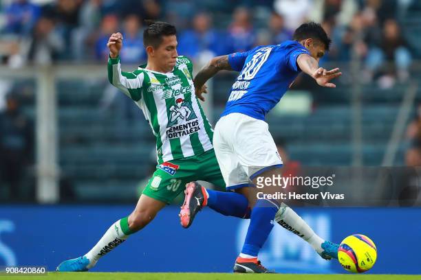 Jose Rodriguez of Leon struggles for the ball with Walter Montoya of Cruz Azul during the 3rd round match between Cruz Azul and Leon as part of the...
