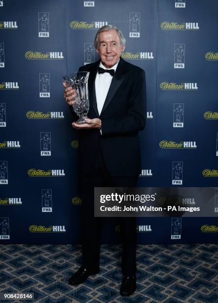 Gordon Banks who receives the trophy on behalf of Pele during the Football Writers Association Tribute Night at The Savoy, London.