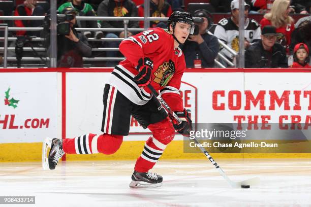 Gustav Forsling of the Chicago Blackhawks controls the puck in the third period against the Buffalo Sabres at the United Center on December 8, 2017...