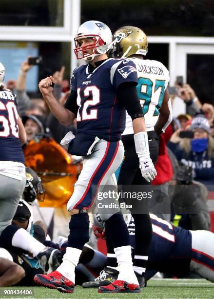 Tom Brady of the New England Patriots reacts after a touchdown in the second quarter during the AFC Championship Game against the Jacksonville...