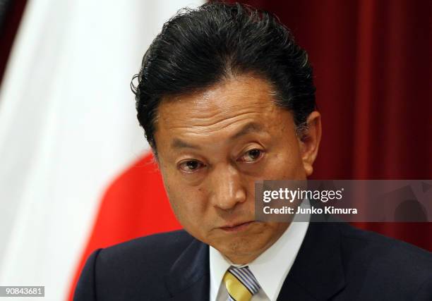 Newly elected Japanese Prime Minister Yukio Hatoyama speaks during a press conference at the Prime Minister's official residence on September 16,...