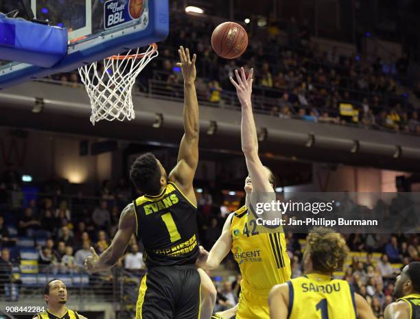 Dwayne Evans of the MHP Riesen Ludwigsburg and Dennis Clifford of Alba Berlin during the game between Alba Berlin and MHP Riesen Ludwigsburg on...