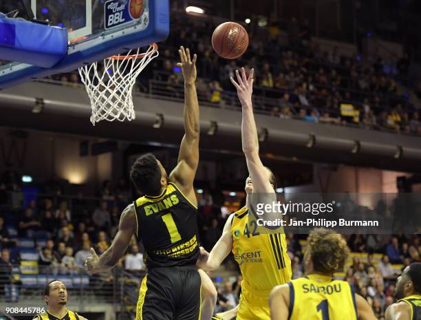 Dwayne Evans of the MHP Riesen Ludwigsburg and Dennis Clifford of Alba Berlin during the game between Alba Berlin and MHP Riesen Ludwigsburg on...