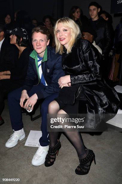 Patrick Gibson and Courtney Love attend the Kenzo Menswear Fall/Winter 2018-2019 show as part of Paris Fashion Week on January 21, 2018 in Paris,...