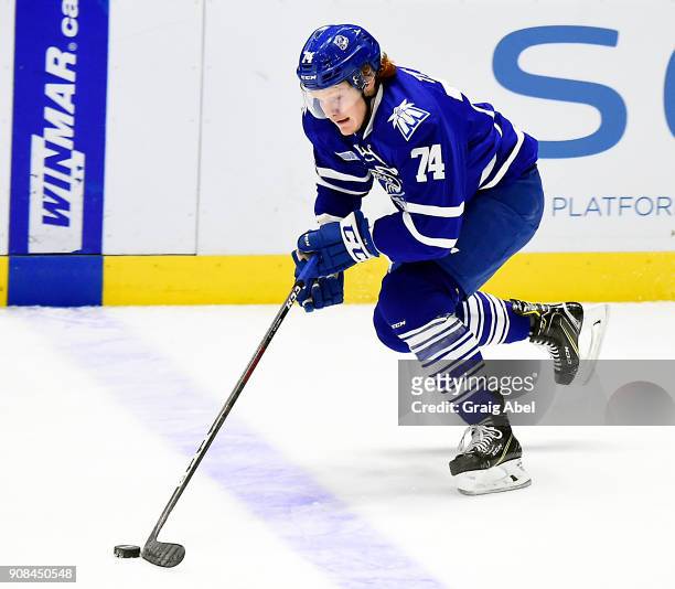 Owen Tippett of the Mississauga Steelheads controls the puck against the Barrie Colts on January 19, 2018 at Hershey Centre in Mississauga, Ontario,...