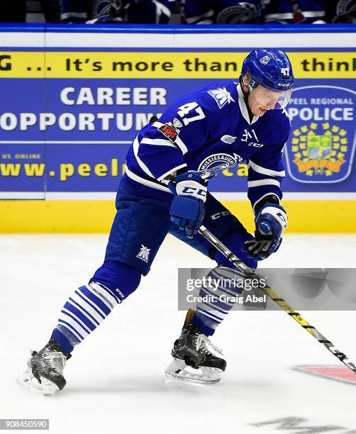 Trent Fox of the Mississauga Steelheads controls the puck against the Barrie Colts on January 19, 2018 at Hershey Centre in Mississauga, Ontario,...
