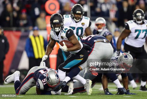 Yeldon of the Jacksonville Jaguars carries the ball in the third quarter during the AFC Championship Game against the New England Patriots at...