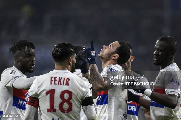 Lyon's Dutch forward Memphis Depay celebrates with teammates after scoring a goal during the French L1 football match between Olympique Lyonnais and...