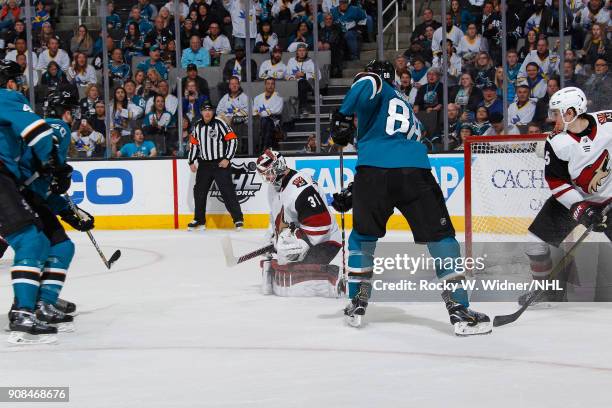 Scott Wedgewood of the Arizona Coyotes saves the puck against the San Jose Sharks at SAP Center on January 13, 2018 in San Jose, California.