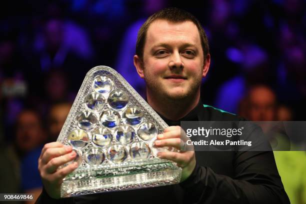 Mark Allen lifts the trophy as he celebrates victory following The Dafabet Master Final between Kyren Wilson and Mark Allen at Alexandra Palace on...