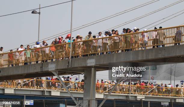 Thousands of people gather for Pope Francis ahead of making a speech on the balcony of the Cathedral, during the last day of his visit in the Plaza...