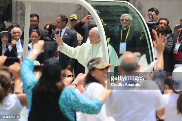 Pope Francis greets the crowd from the popemobile during the last day of his visit in the Plaza de Armas in Lima, Peru on January 22, 2018.