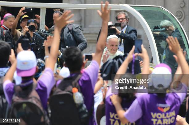 Pope Francis greets the crowd from the popemobile during the last day of his visit in the Plaza de Armas in Lima, Peru on January 22, 2018.