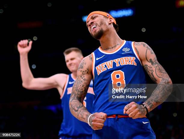 Michael Beasley and Kristaps Porzingis of the New York Knicks react after a lost possession to the Los Angeles Lakers during a 127-107 Laker win at...