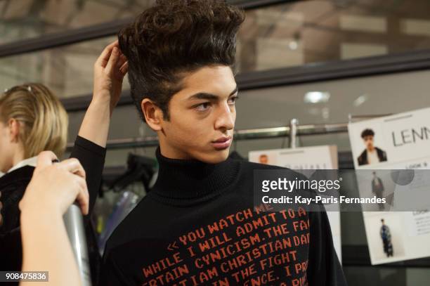 Model prepares backstage prior the Christian Dada Menswear Fall/Winter 2018-2019 show as part of Paris Fashion Week on January 21, 2018 in Paris,...