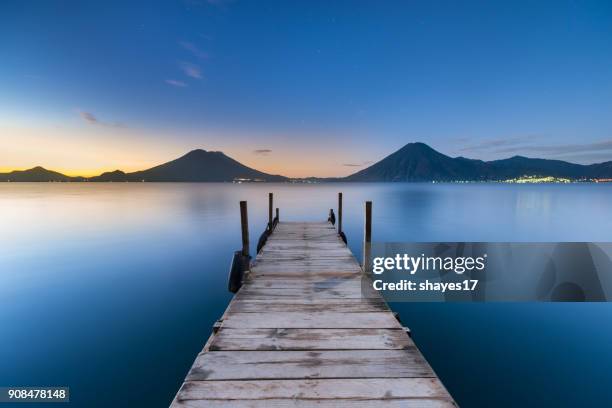 sunrise lake atitlán - lake atitlan stock pictures, royalty-free photos & images