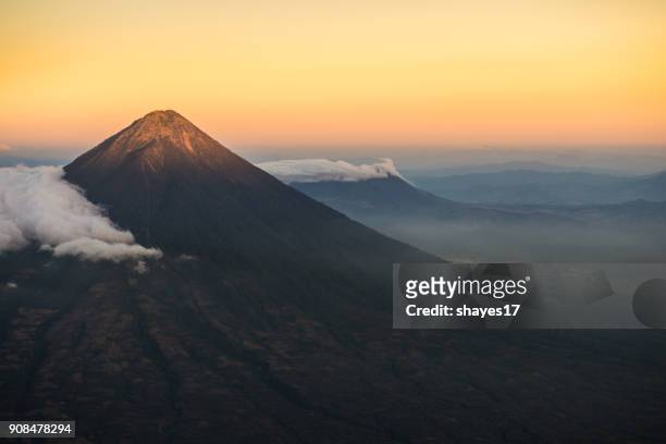 agua volcano sunset - guatemala stock pictures, royalty-free photos & images