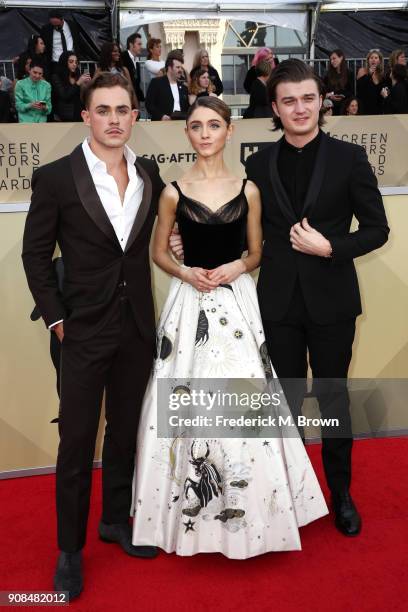 Actors Dacre Montgomery, Natalia Dyer and Joe Keery attend the 24th Annual Screen Actors Guild Awards at The Shrine Auditorium on January 21, 2018 in...