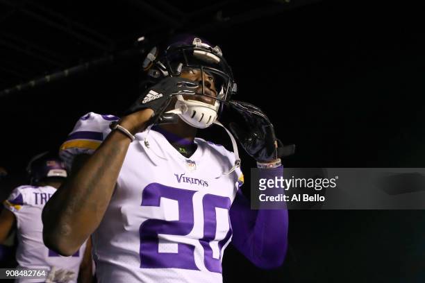 Mackensie Alexander of the Minnesota Vikings walks out on the field for warm ups prior to the NFC Championship game against the Philadelphia Eagles...