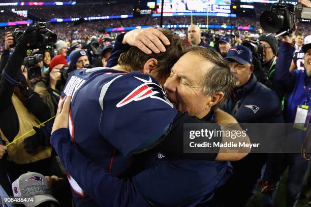 Tom Brady of the New England Patriots celebrates with head coach Bill Belichick after winning the AFC Championship Game against the Jacksonville...