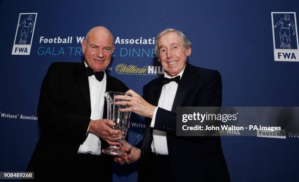 Chairman of the FWA Patrick Barclay presents the trophy to Gordon Banks on behalf of Pele during the Football Writers Association Tribute Night at...