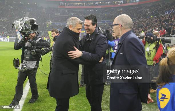 Head coach Bruno Genesio of Olympique Lyonnais react with Unai Emery of Paris Saint-Germain before the Ligue 1 match between Olympique Lyonnais and...