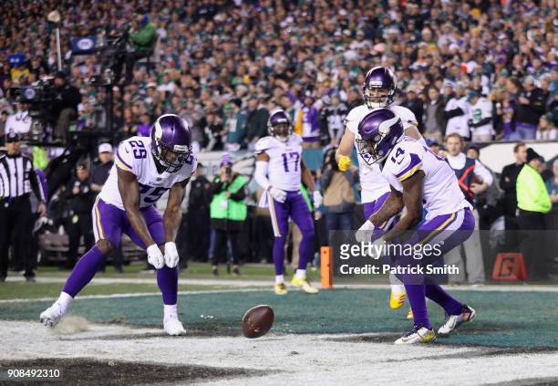 Latavius Murray and Stefon Diggs of the Minnesota Vikings celebrate the first quarter touchdown by Kyle Rudolph against the Philadelphia Eagles in...