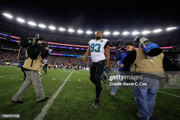 Calais Campbell of the Jacksonville Jaguars walks offsides the field after the AFC Championship Game against the New England Patriots at Gillette...