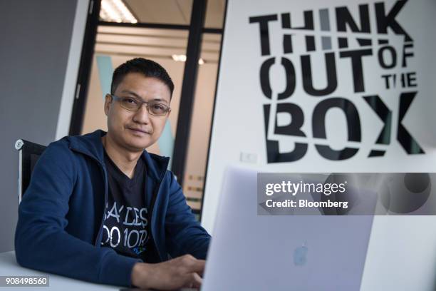 Aung Kyaw Moe, founder and chief executive officer of 2C2P Pte, sits for a photograph in Bangkok, Thailand, on Thursday, Jan. 18, 2018. Aung is...