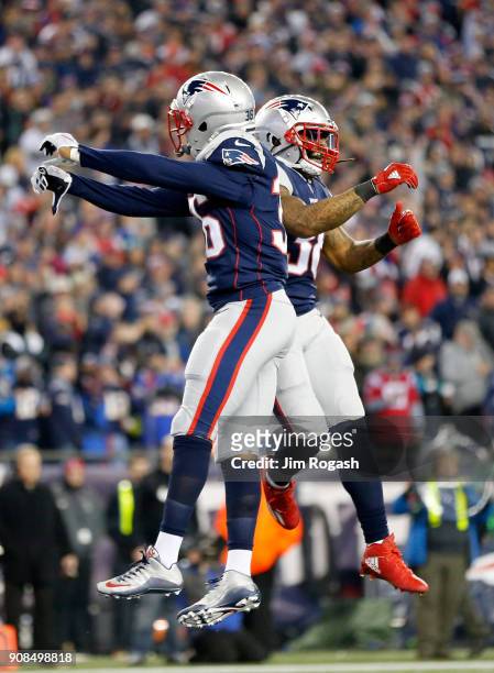 Brandon King and Brandon Bolden of the New England Patriots celebrate after a stop in the fourth quarter against the Jacksonville Jaguars during the...