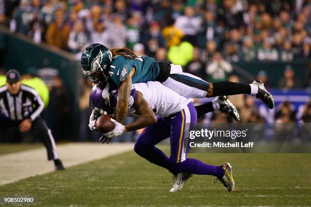 Stefon Diggs of the Minnesota Vikings is tackled by Ronald Darby of the Philadelphia Eagles during the first quarter in the NFC Championship game at...