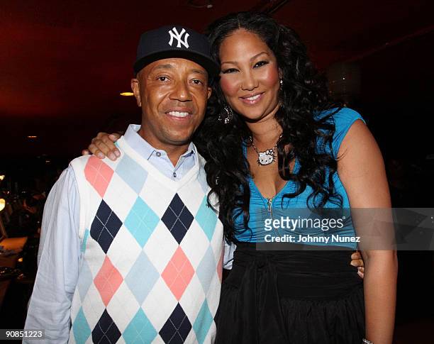 Russell Simmons and Kimora Lee Simmons attend the Baby Phat & KLS Collection Spring 2010 during Mercedes-Benz Fashion Week at Roseland Ballroom on...