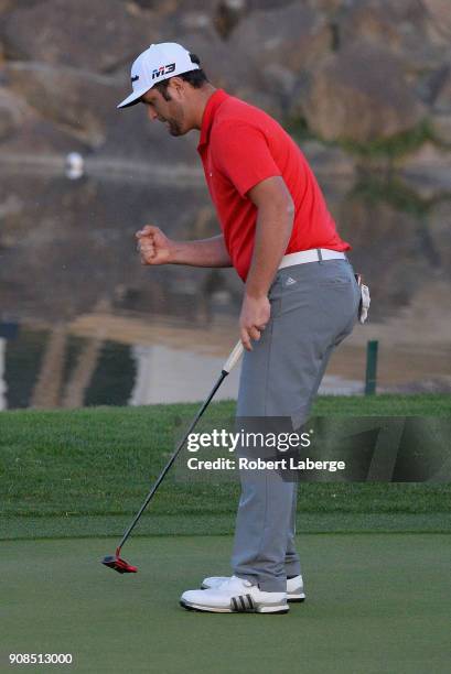 Jon Rahm of Spain reacts to his putt to win on the fourth hole of a sudden death playoff during the final round of the CareerBuilder Challenge at the...