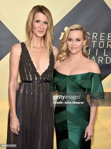 Actors Laura Dern and Reese Witherspoon attend the 24th Annual Screen Actors Guild Awards at The Shrine Auditorium on January 21, 2018 in Los...