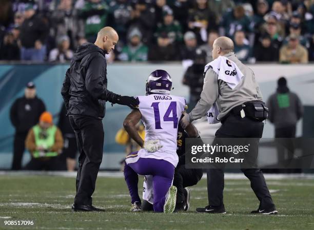 Stefon Diggs of the Minnesota Vikings is looked at by the trainers during the first quarter against the Philadelphia Eagles in the NFC Championship...