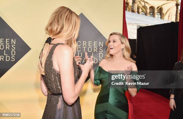 Actors Laura Dern and Reese Witherspoon attend the 24th Annual Screen Actors Guild Awards at The Shrine Auditorium on January 21, 2018 in Los...