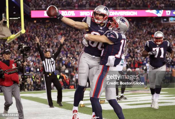 New England Patriots wide receiver Danny Amendola and New England Patriots wide receiver Chris Hogan celebrate Amendola's game-winning reception. The...