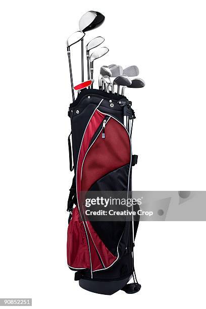 full set of golf clubs held in a golf bag - golf bag stock pictures, royalty-free photos & images