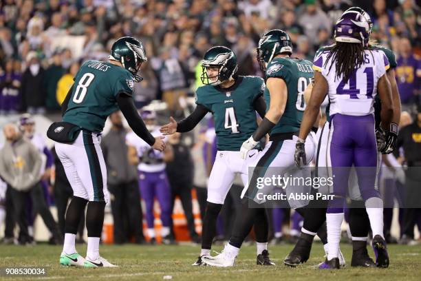 Jake Elliott is congratulated by Donnie Jones of the Philadelphia Eagles after kicking a second quarter field goal against the Minnesota Vikings in...