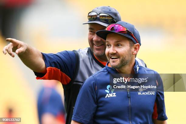 Coach Mike Hesson and batting coach Craig McMillan of New Zealand enjoy a laugh during game one of the Twenty20 series between New Zealand and...