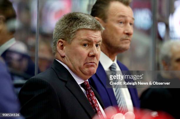 Carolina Hurricanes' head coach Bill Peters and assistant coach Steve Smith aren't happy after the team gave up the third goal during the first...